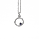 Circle of life iolite pendant necklace sterling silver hanging from a cable chain
