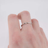 Rope sterling silver ring shown on finger
