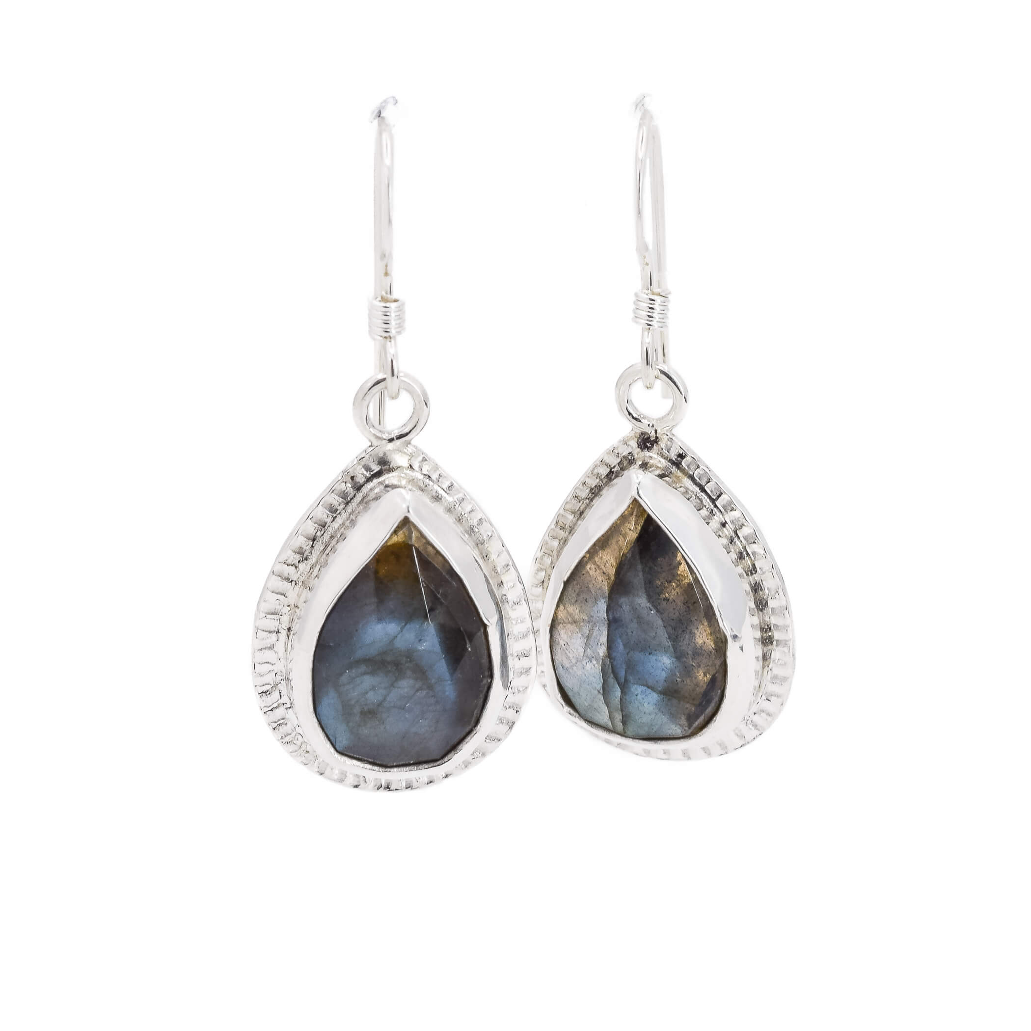 Teardrop shaped labradrotie drop earrings set in sterling silver with a detailed border adorning the edges of the stones