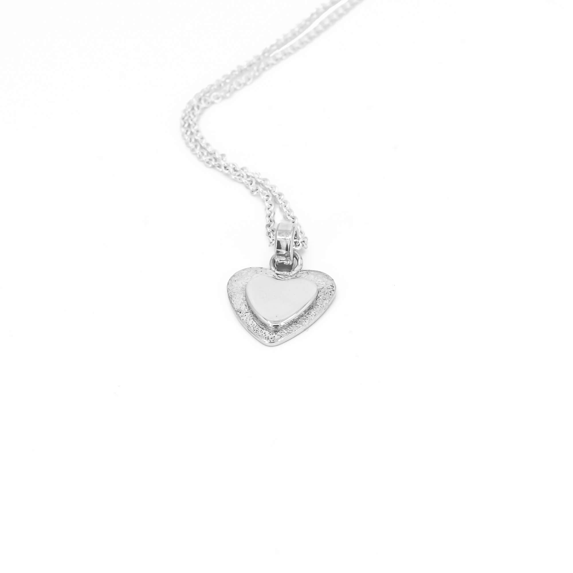 Sterling silver heart necklace with stardust texture