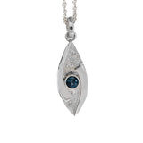 small hugged pendant necklace in sterling silver with a stardust texture and a 4mm London Blue Topaz faceted stone