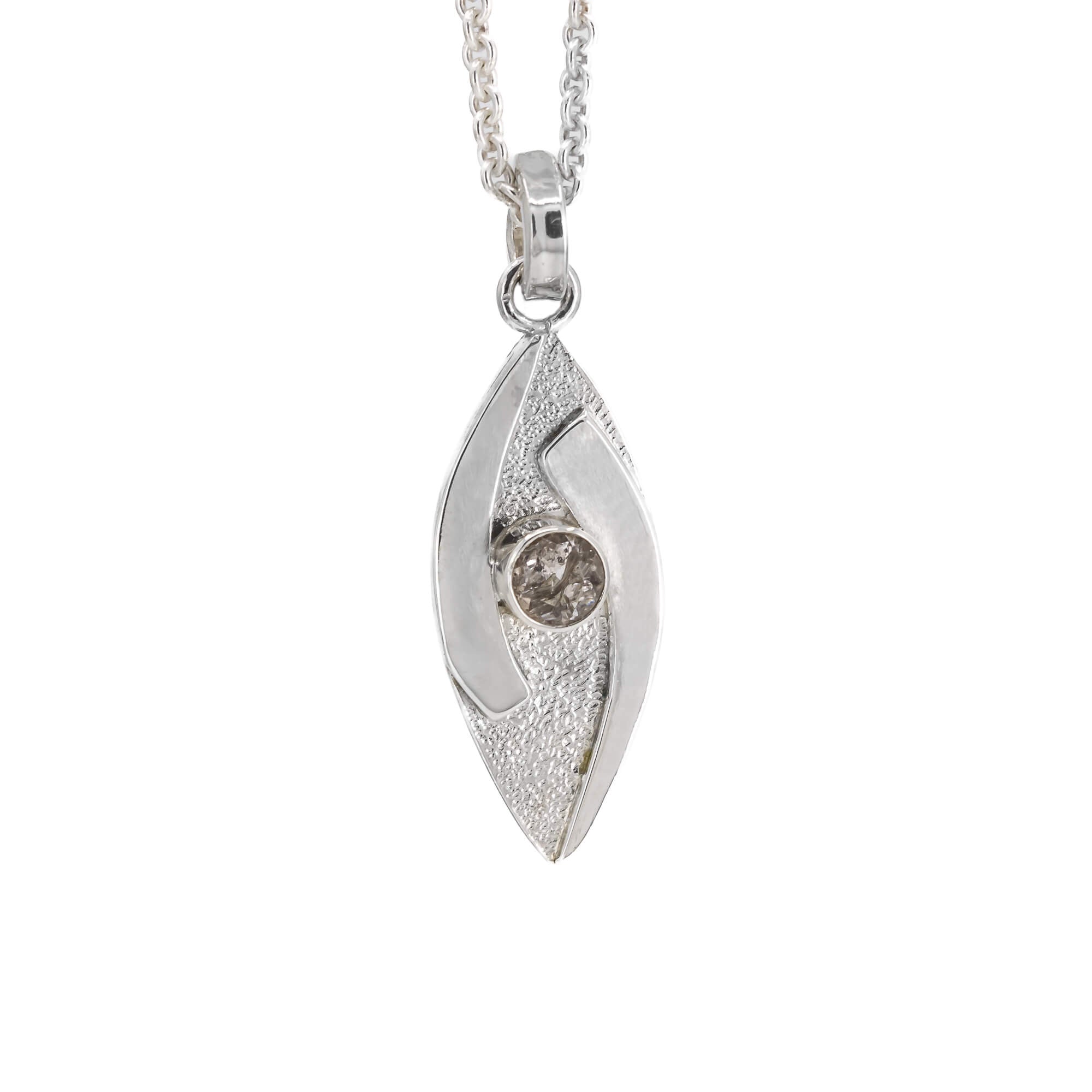 small hugged pendant necklace in sterling silver with a stardust texture and a 4mm Morganite faceted stone