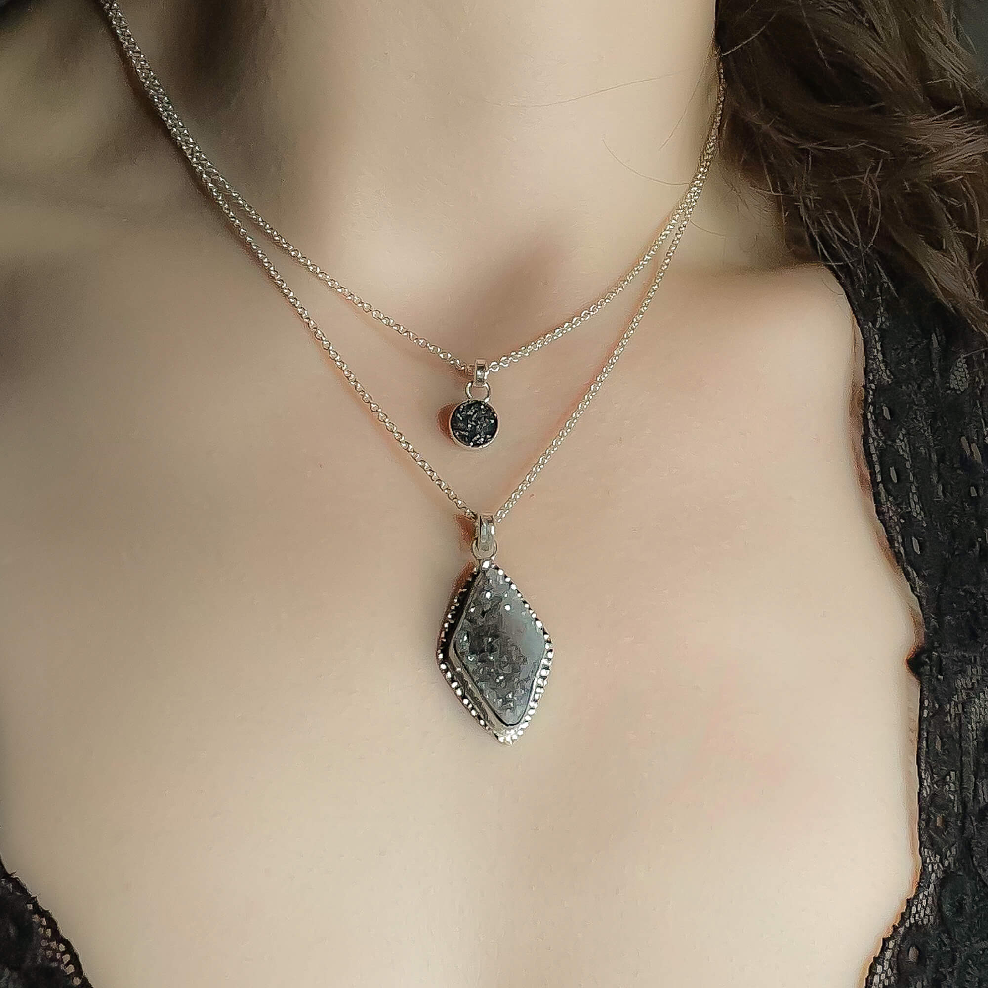Small black druzy pendant necklace sterling silver  shown on model layered with a diamond shaped grey and black druzy pendant