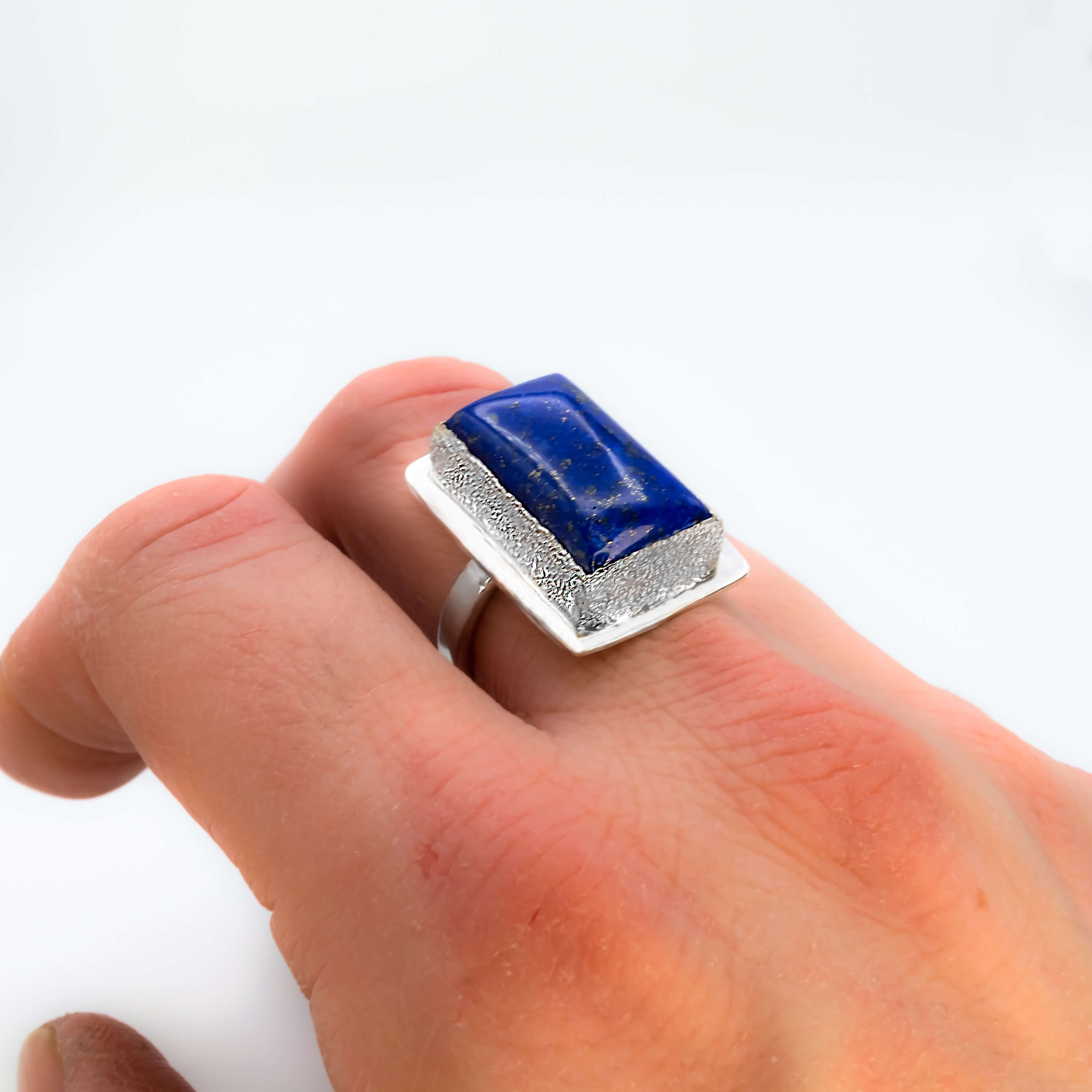 Lapis-lazuli-large-cocktail-ring-sterling-silver-on-hand