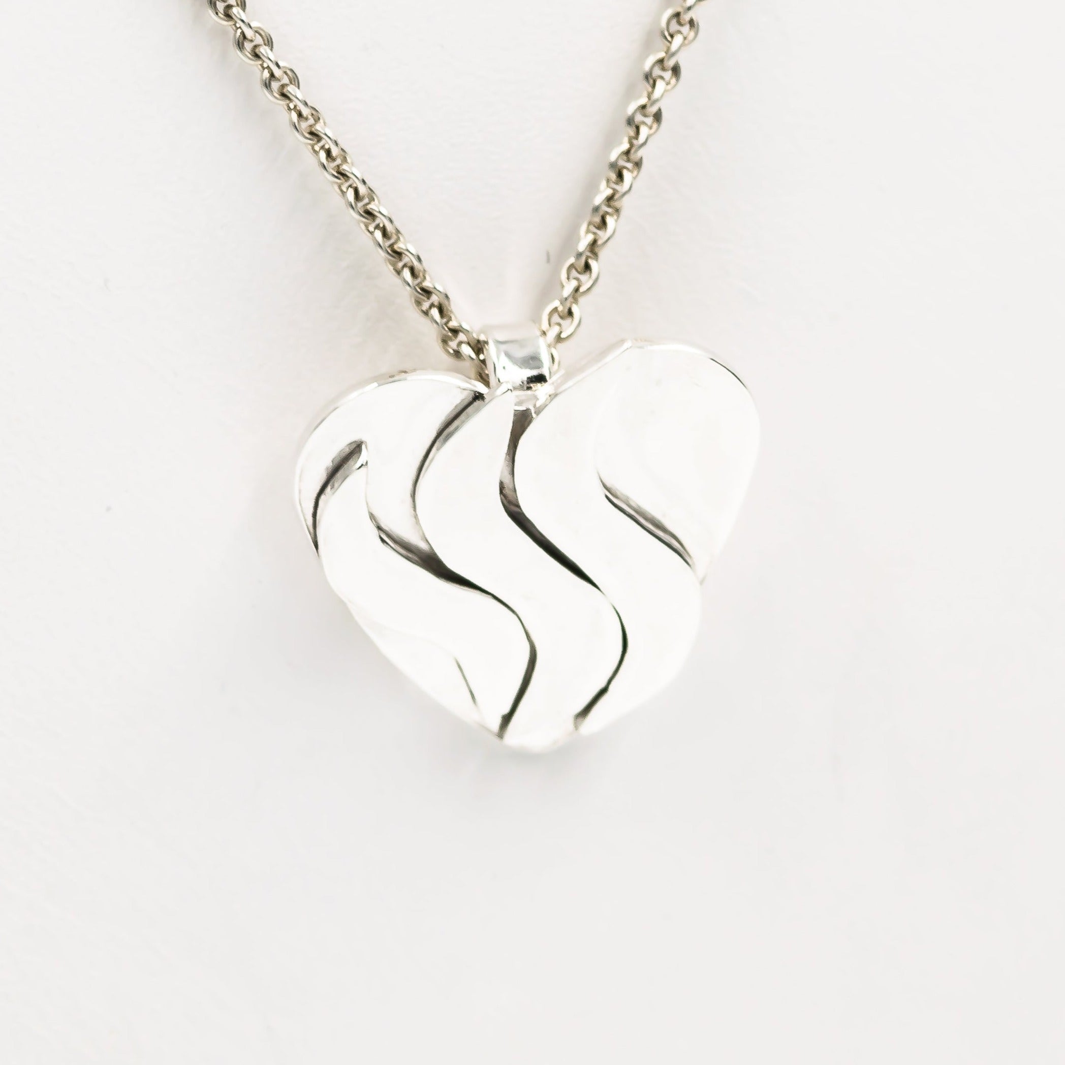 Sterling-silver-heart-pendant-with-3-waves