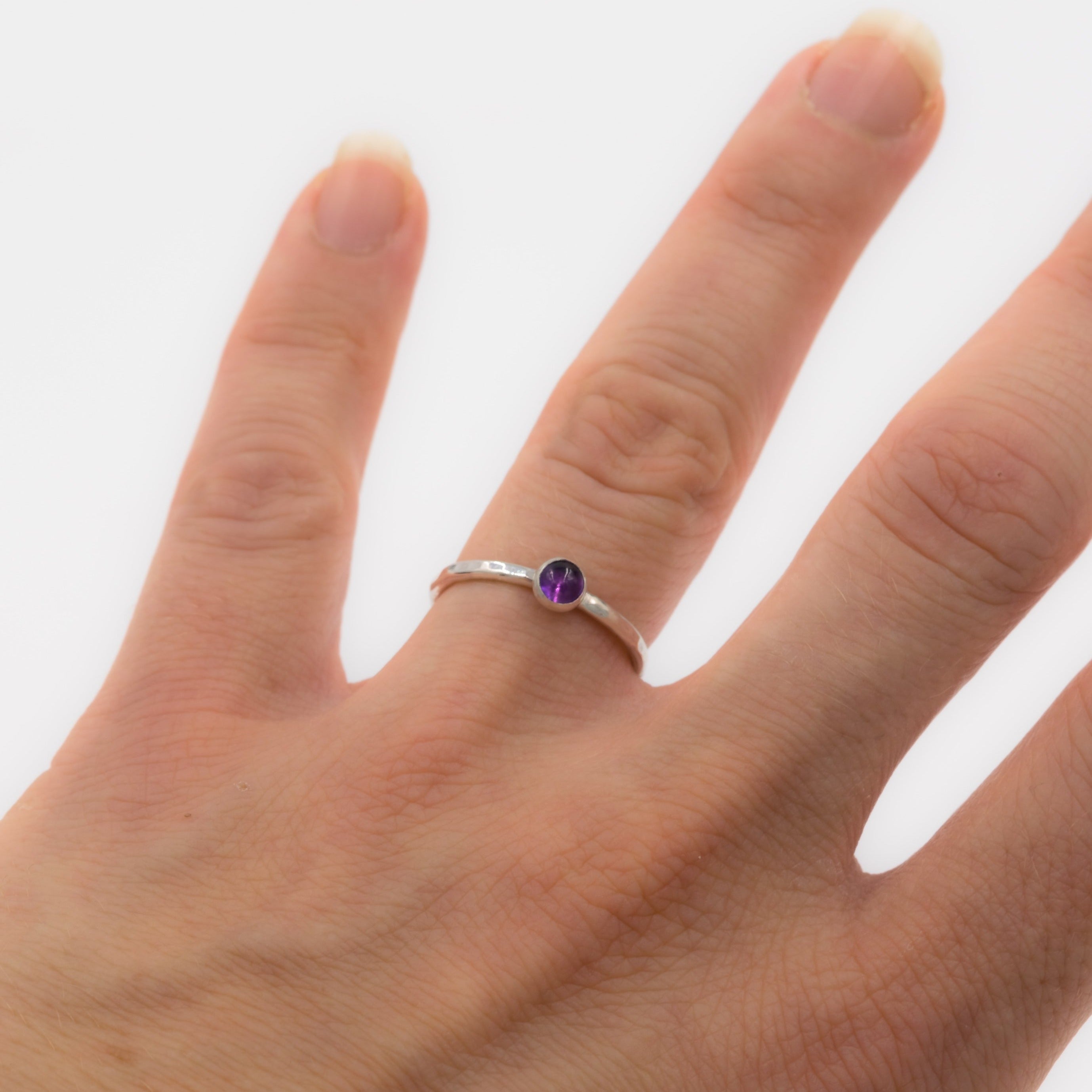 textured sterling silver stackable amethyst ring on model