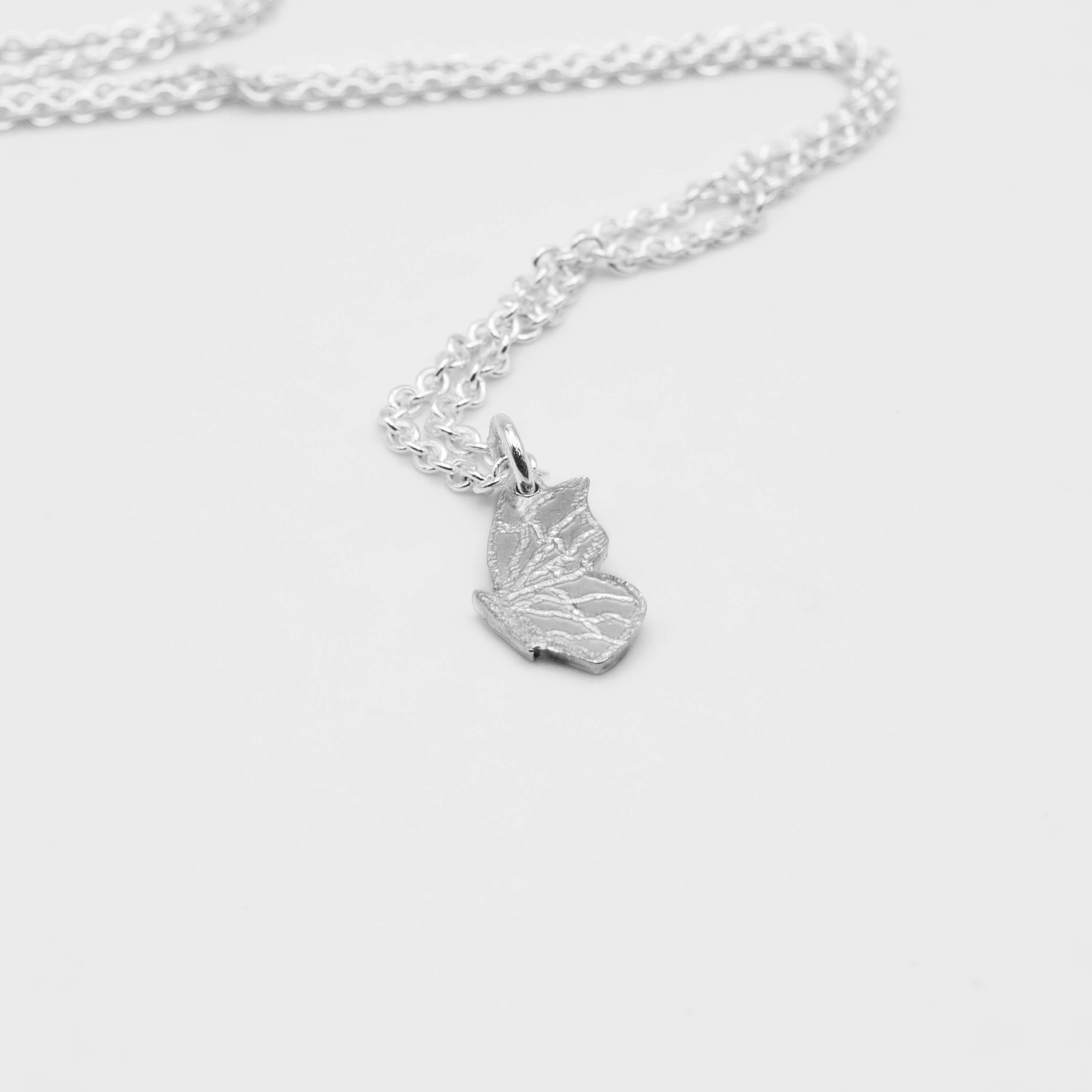 Dainty Sterling silver butterfly pendant